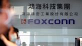 Taiwan's Foxconn says is shareholder of troubled Chinese chip firm