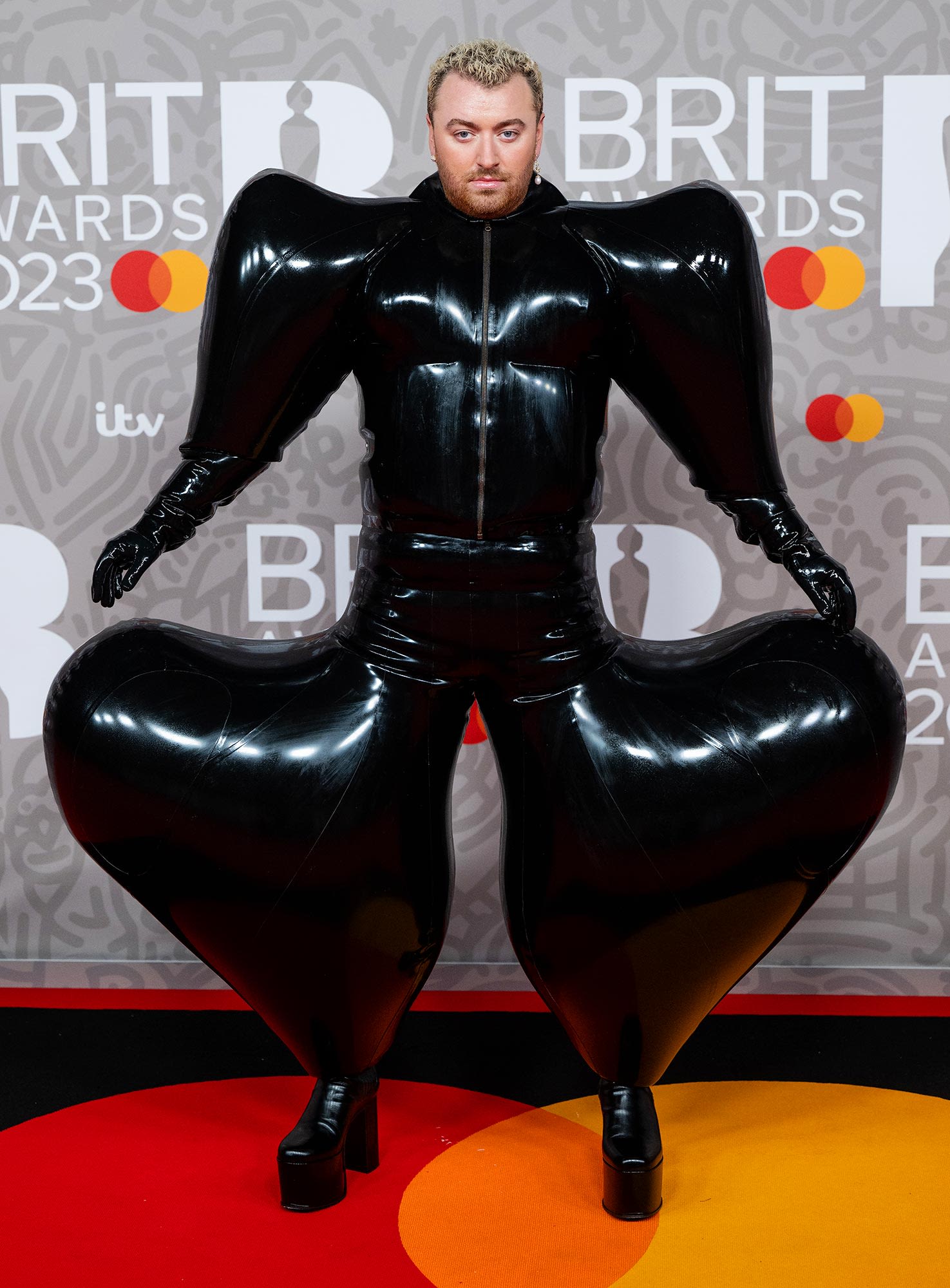 Sam Smith Recalls Struggling to Walk in Their 2023 Brit Awards Latex Outfit: ‘I’m Squeaking’