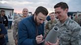 Chris Evans Clarified What The Deal Was With That Photo Of Him Seemingly Signing A Bomb For Armed Forces