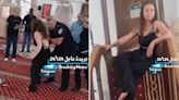 Woman in revealing outfit argues with Muslim men and police in mosque