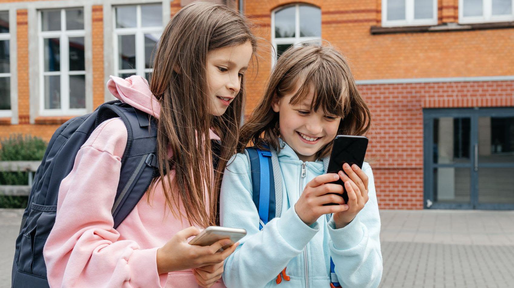 School phone pouch plan criticised by Naomi Long