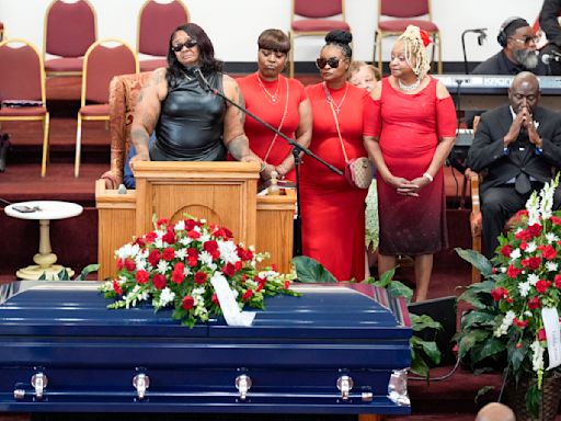 Family vows during funeral to push for charges after Black man pinned to ground outside hotel