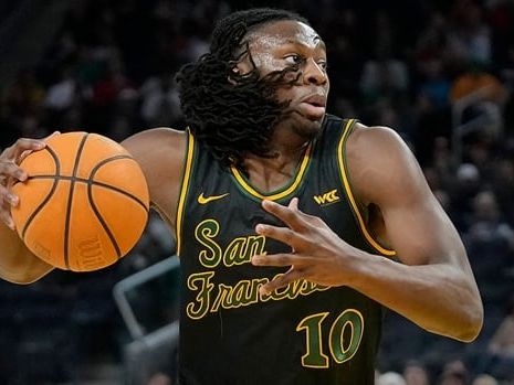 Raptors draft centre Jonathan Mogbo 31st overall, reportedly trade McDaniels to Kings | CBC Sports