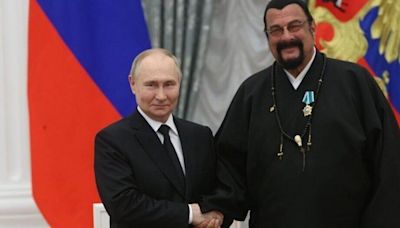 Propaganda puppet: Steven Seagal receives medal from Putin