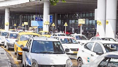 Fliers face taxi tout ordeal: Airport chaos same as before, cops await order