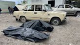 Surrounded by body bags - Putin's 'war crimes' only strengthen Ukraine's resolve