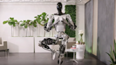 Tesla unveils new yoga-practicing robot