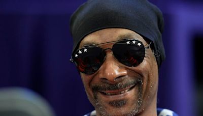 Mark Kiszla: Reefer madness! Snoop Dogg has stolen the show in Paris and become the new lord of the Olympic rings