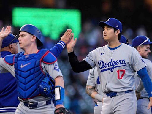 Will Smith's double ignites seven-run 11th inning as the Dodgers beat the Giants 14-7