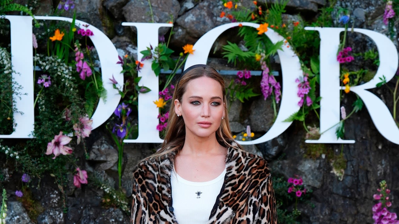 Jennifer Lawrence Pulls Off Mob Wife Style at the Dior Show