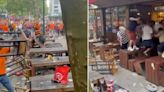 Dutch fans fling chairs and bottles at England supporters before Euro semi-final