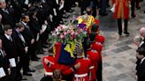 The significance of the floral wreath on Queen’s coffin