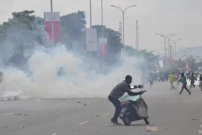 Nigerian leader calls for end to hardship protests, blaming 'political agenda' for violence