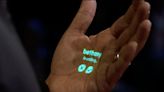 An ex-Apple designer showed off a futuristic AI device that projects phone calls onto your hand