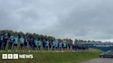 Carlisle United fans and players honour Andrew Jenkins