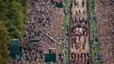 Mourners in Windsor say Queen’s coffin procession marks ‘end of an era’