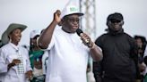 Sierra Leone’s president takes early lead in tense election race