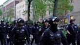 NYPD officers arrive near Columbia University where pro-Palestinian students are barricaded inside a building and have set up an encampment, in New York City on April 30, 2024