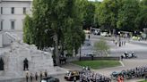 Photos show Queen Elizabeth II leaving London for the last time as she begins her final journey to Windsor Castle