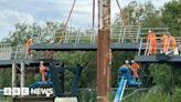 Final section of new Worcester footbridge lifted into place