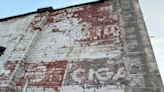 Ghost signs dating back to ’30s or before revealed on under-construction Wichita building