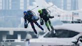 ‘Iron Man’ pilots race in jet suits against a backdrop of Dubai skyscrapers