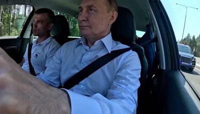 Putin drives a Lada without a bulletproof vest on after Trump's narrow miss