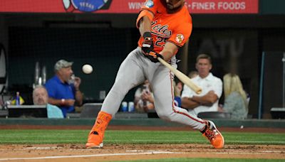 Grayson Rodriguez gets AL-best 12th win as Orioles hit 3 more homers to beat Rangers 8-4