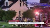 Fire starts in garage, engulfs 2 homes in Middlesex