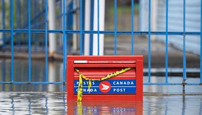 Canada Post lost $748 million last year, warns of 'critical' financial situation