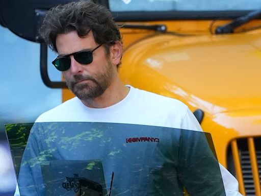 Bradley Cooper oozes movie star cool with gleaming black shades