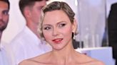 Princess Charlene epitomises Hollywood glamour in strapless gown and diamond earrings