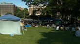 Pro-Palestinian encampment grows as protesters push for Johns Hopkins University to divest from Israel