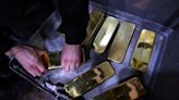 Gold hits two-week high as bond yields fall; US jobs data on tap
