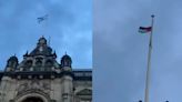 Protestor scales Sheffield town hall roof to rip down Israeli flag and replace it with Palestinian symbol