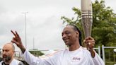 Snoop Dogg Carries Olympic Torch In Paris, Sets Internet Ablaze With Memes