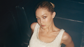 Gigi Hadid is party-ready in black bodysuit with two *huge* cut-outs