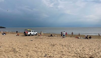 Families told to 'get out of the water' at packed beach due to 'safety alert'