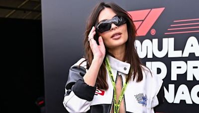 We're obsessed with EmRata's string bikini and leather racing suit 'fit