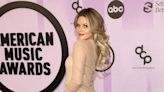 'DWTS' Pro Witney Carson Debuts Baby Bump on 2022 AMAs Red Carpet — and Squeezes in a Quick Dance