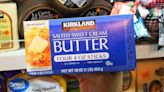 Here's Why Costco's Kirkland Brand Butter Has That Colorful Text On The Box