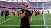 Albania's Daku banned for offensive chants