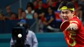 Table Tennis-China gold medalist Wang's joy cut short by paparazzi paddle accident