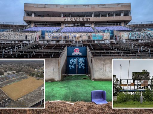 Abandoned Olympics stadium shadow of its former self with disintegrating stands