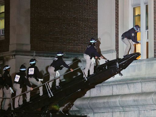 Columbia campus stormed by NYPD as dozens of students arrested to end occupation of college building: Live