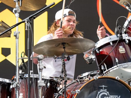 "Watch this!” says Dave Grohl as Shane Hawkins plays drums with Foo Fighters during two consecutive London dates