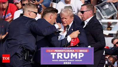 Trump assassination attempt new video: Fresh footage shows suspect on roof moments before attack - Times of India