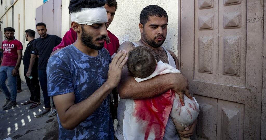 A Gaza father mourns his baby boy, killed in bed by an Israeli airstrike