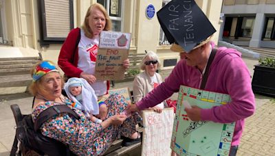 Protest outside town hall against rent exploitation