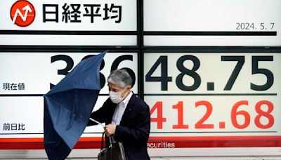 Stock market today: Asian shares mostly higher, though China benchmarks falter